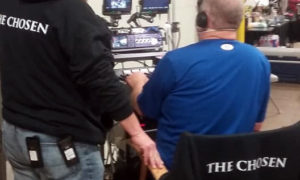 Documentary film crew behind the scenes